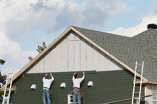 Professional Siding technician working in Renovo, PA